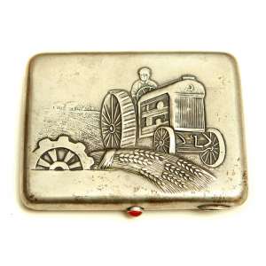 The Soviet cigarette case silver with a picture of a tractor, 1943