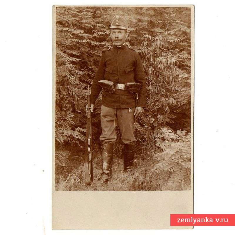 Photo Austrian soldier with a rifle Mannlicher