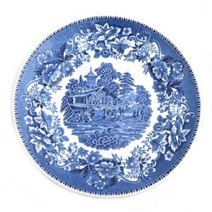 Plate with decorative rustic plot