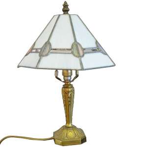 Bronze bedside lamp with shade in the style of "Tiffany"