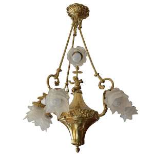 A large bronze chandelier in the classical style