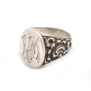 Massive silver ring with the monogram "NM" ("WH"?)