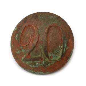The regimental button with the number "20"