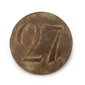 The regimental button with the number "27"