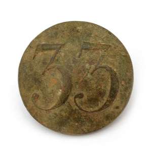 The regimental button with the number "33"