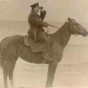 Photo of the CA officer with Stechkin pistol on horseback