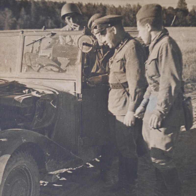 Photo of red army soldiers at the captured German machines, TASS