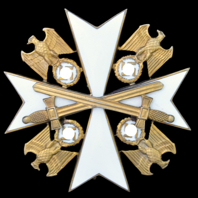 The badge of the order of Merit of the German eagle 4th class with swords c