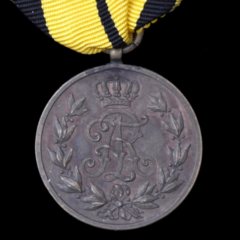 Saxony. Medal of Friedrich August in bronze on the ribbon of nombattv