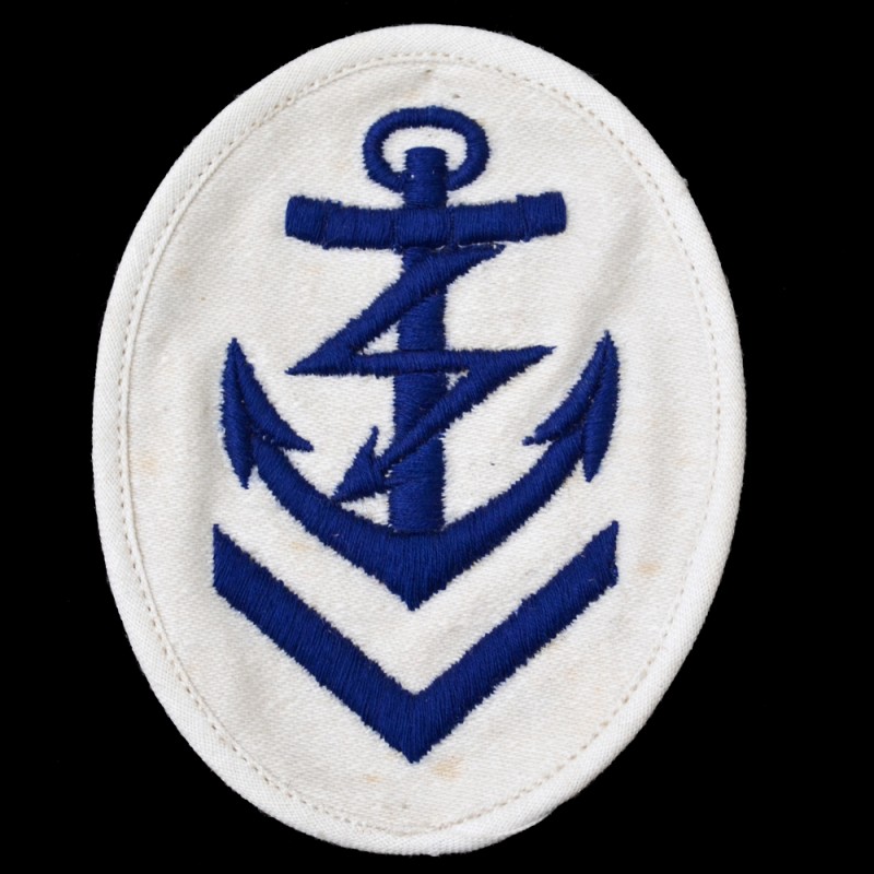 Sleeve patch (special badge) on the white uniform of the senior signalman of the Kriegsmarine
