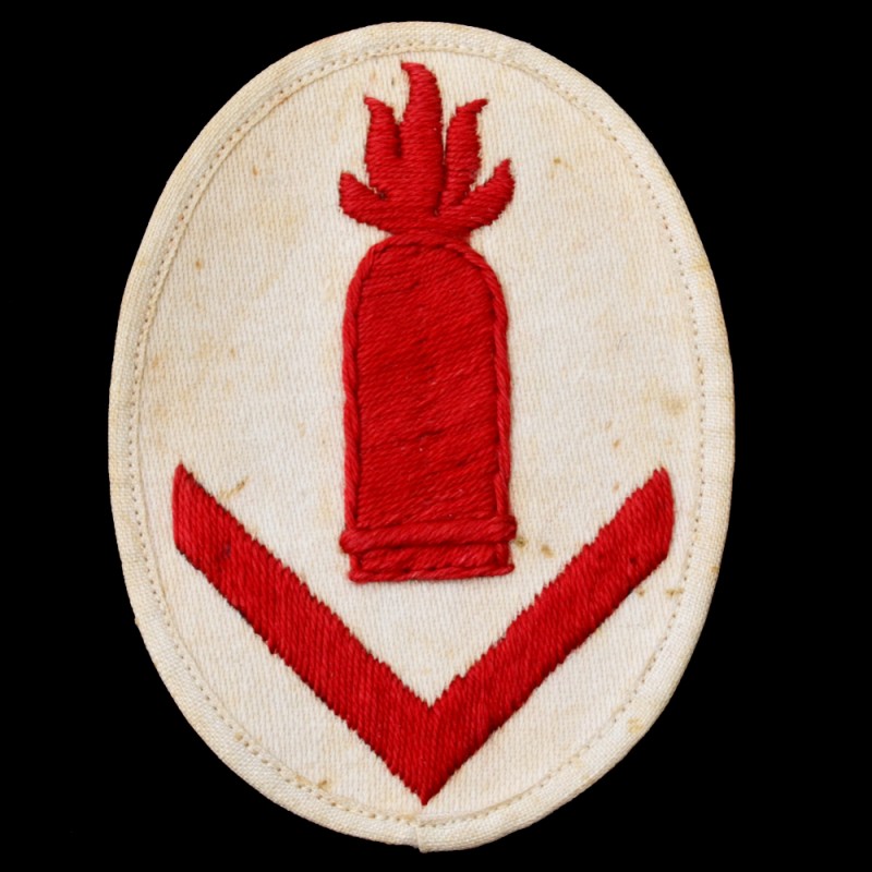 Sleeve patch (special badge) on the white uniform of the senior gunner of the Kriegsmarine