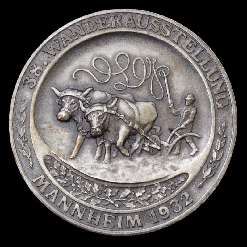 Small silver medal of the exhibition of the organization "Blut und Boden" in 1932.