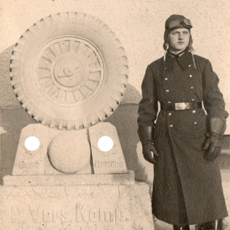 Photo of an NSKK serviceman on the background of the monument