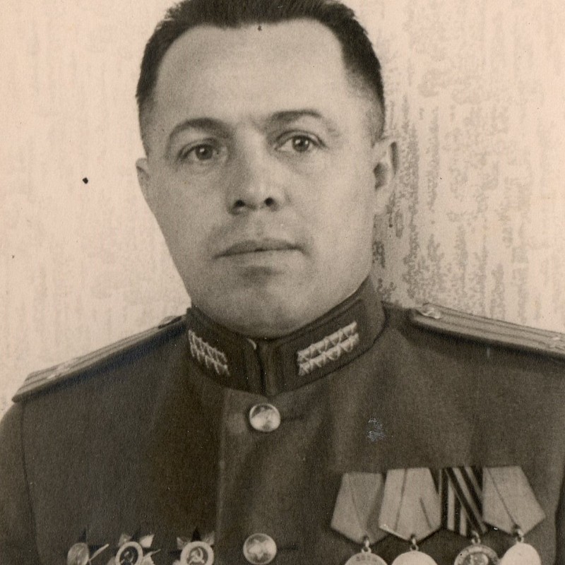 Photo of a major of the Red Army infantry in a ceremonial uniform with combat awards
