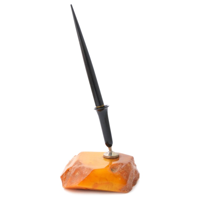 Cabinet writing device made of a single piece of amber