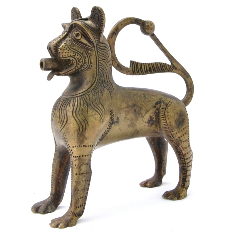 A vessel for oil or oil in the form of a lion 