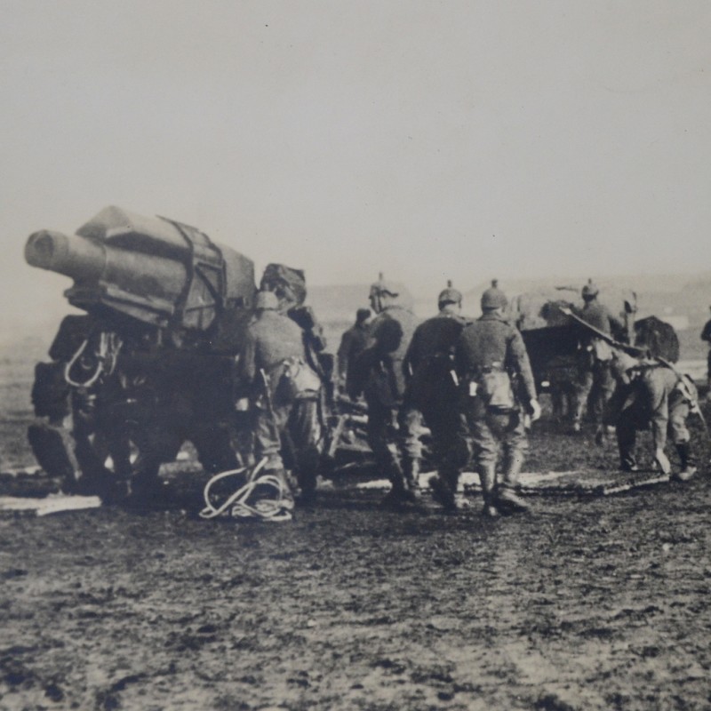 Large-format press photo of a German artillery battery on the march