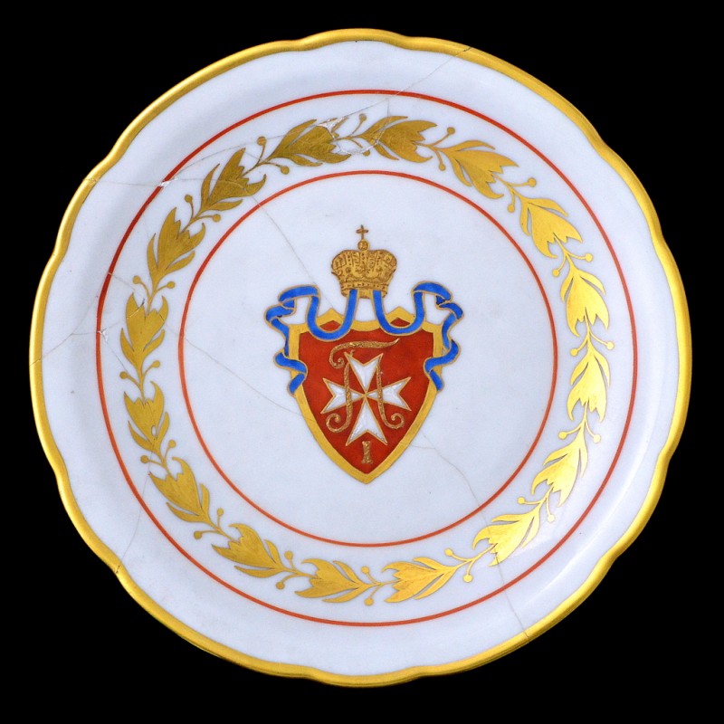 Plate with the image of a badge in memory of the 100th anniversary of the Pavlovsk Military School
