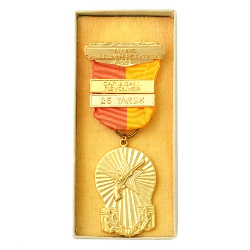 Gold Medal of the State of Maine for firing a 25-yard percussion cap revolver, 1962