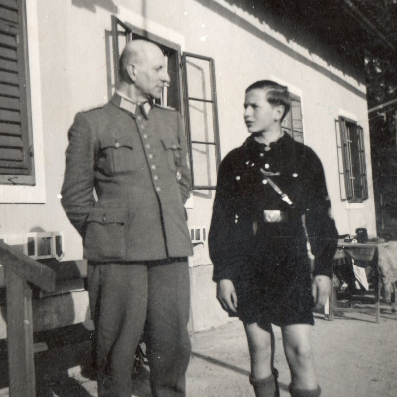 Photo of a German police officer with his son in the uniform of the "Hitler Youth"