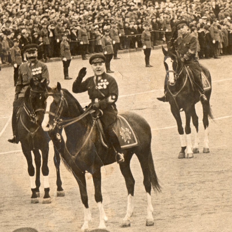 Photo by K. Voroshilov and S. Budyonny on horseback in front of a line of soldiers, 1939