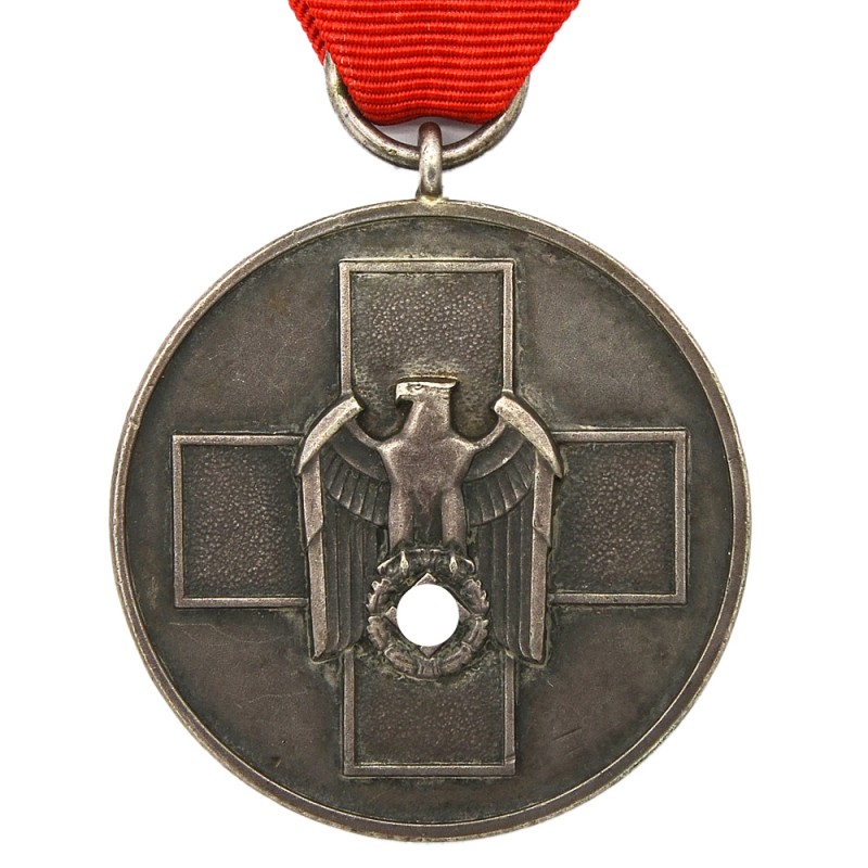 Medal "For caring for the German people" on the original ribbon