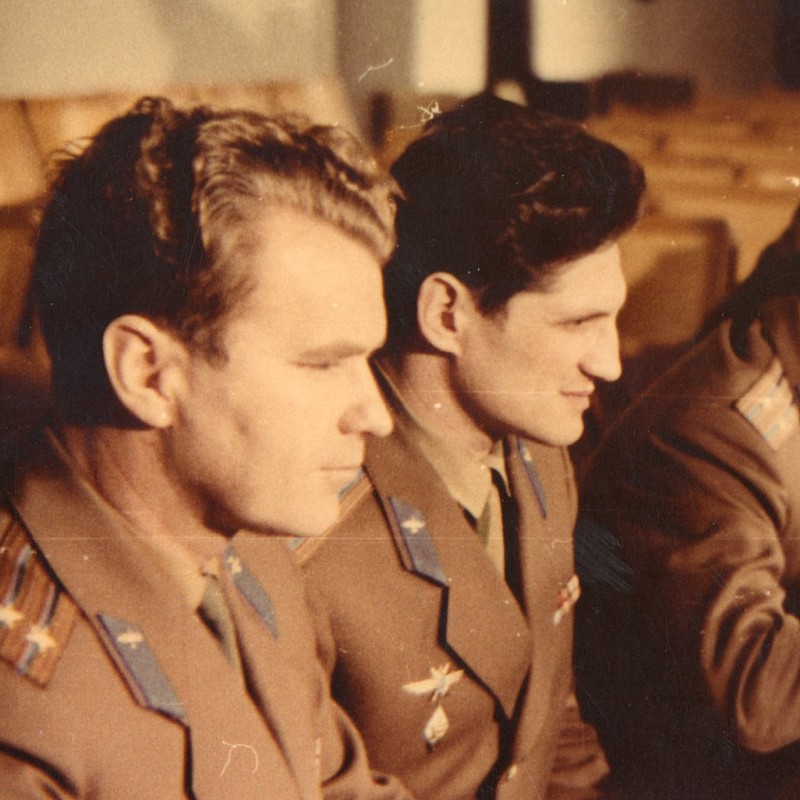 Photo of cosmonauts V.Shatalov, B. Volynov and Yuri Gagarin at the table
