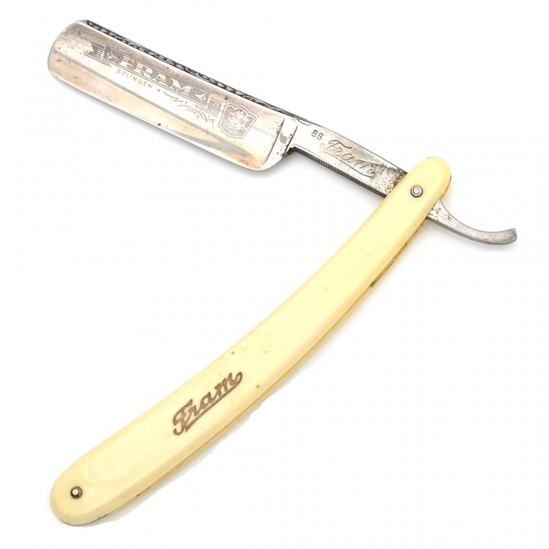 German straight razor with decorated blade