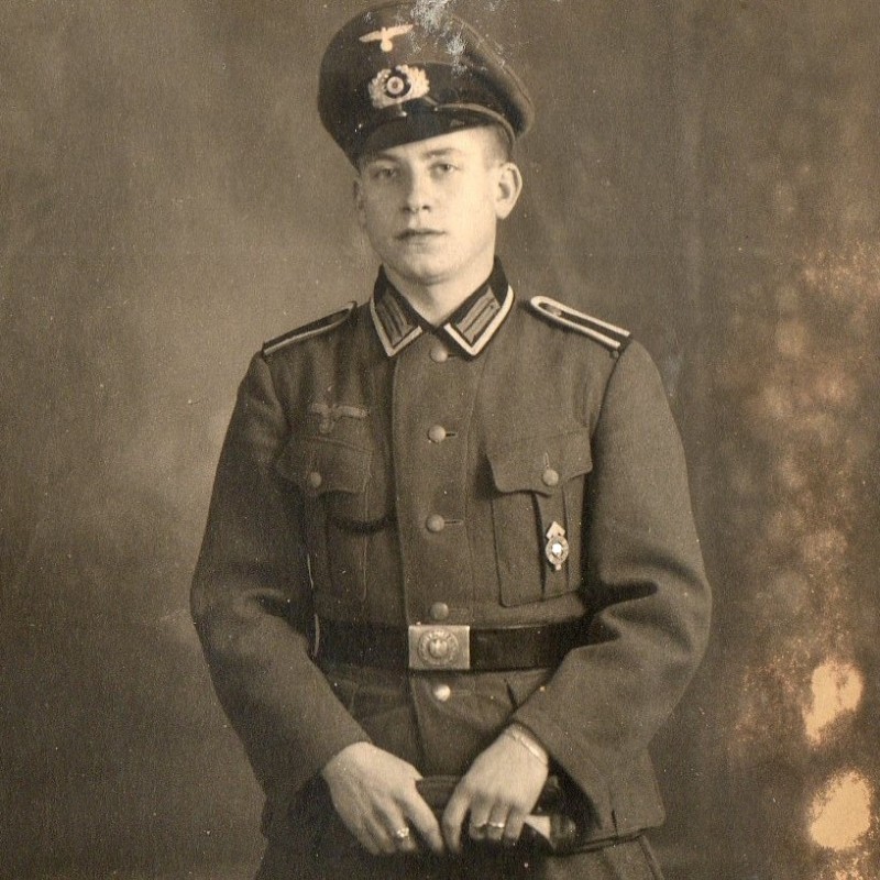 Photo of a non-commissioned officer of the Wehrmacht infantry with the Hitler Youth sports badge in silver