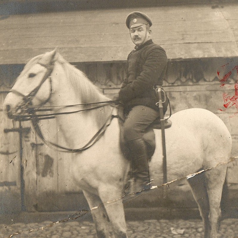 Photo of an RIA officer with a saber of the sample of 1881 on a horse