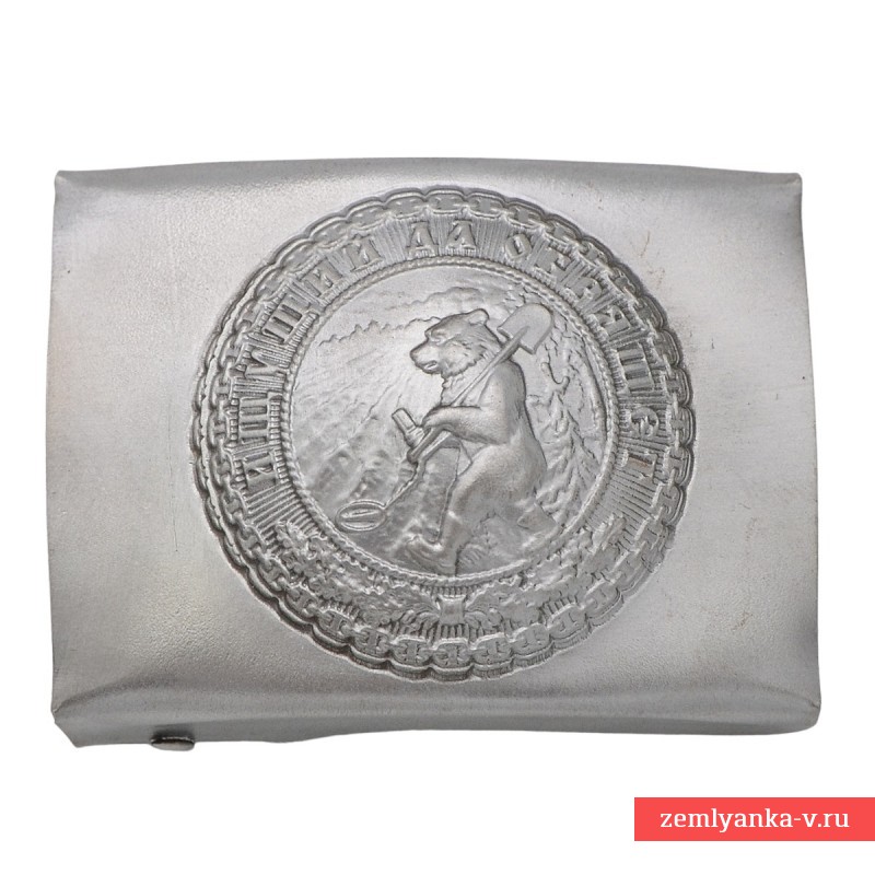 Buckle on the belt of a military archaeologist