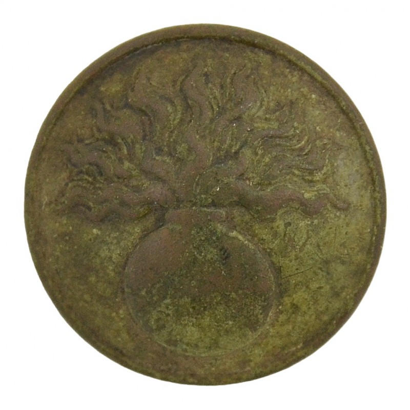 A button from the uniform of a French soldier of one of the Grenadier regiments 