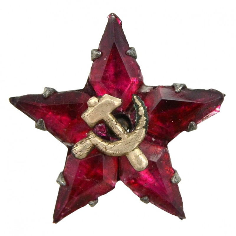 A glass star on a cap or lapel of a jacket