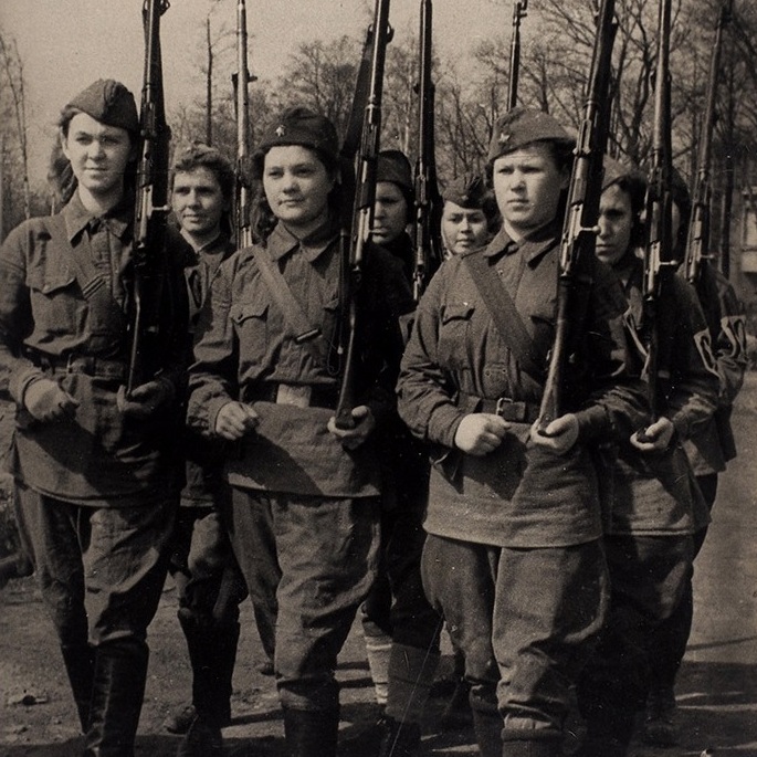 Photo by TASS "Women's division of Vasileostrovsky district of Leningrad", 1942