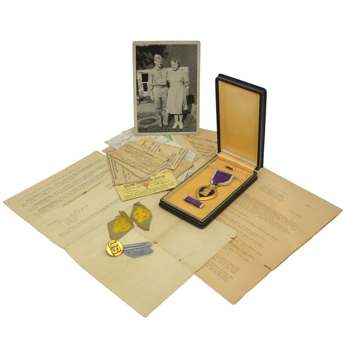 The Purple Heart Medal, awarded by E. Telling for his injury in December 1945