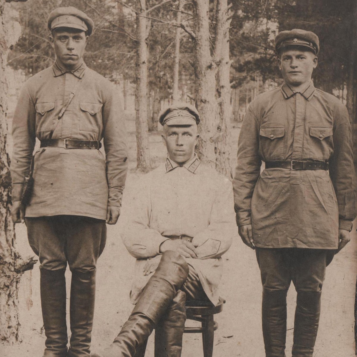 An early photo of the commander and two Red Army soldiers of the Red Army, 1923-24