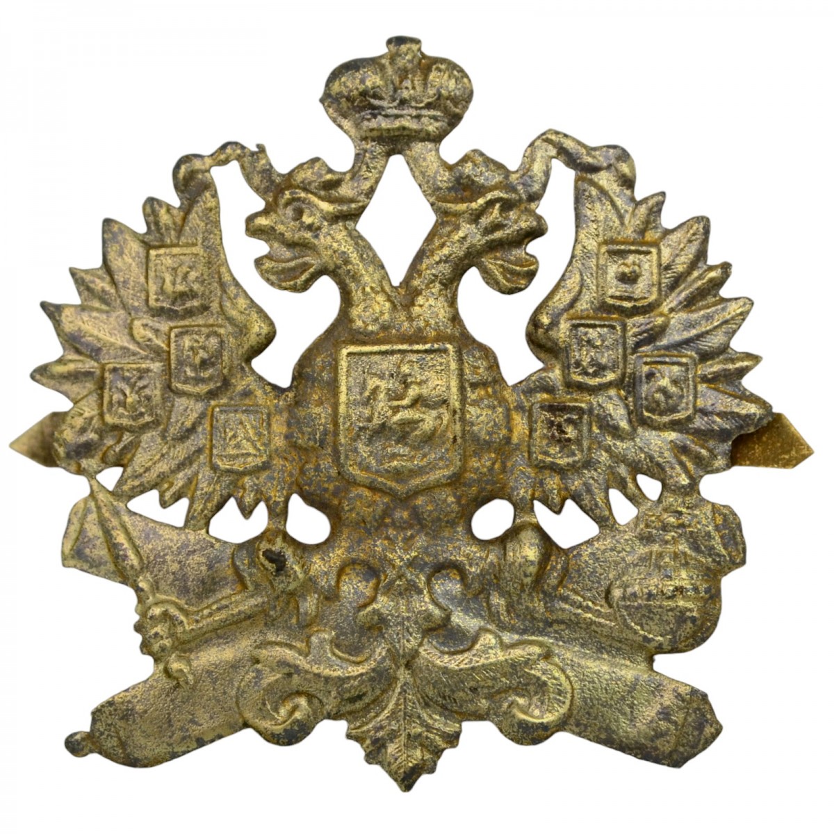 The cockade is an eagle on the shearling cap of the lower ranks of the RIA artillery of the sample of 1881