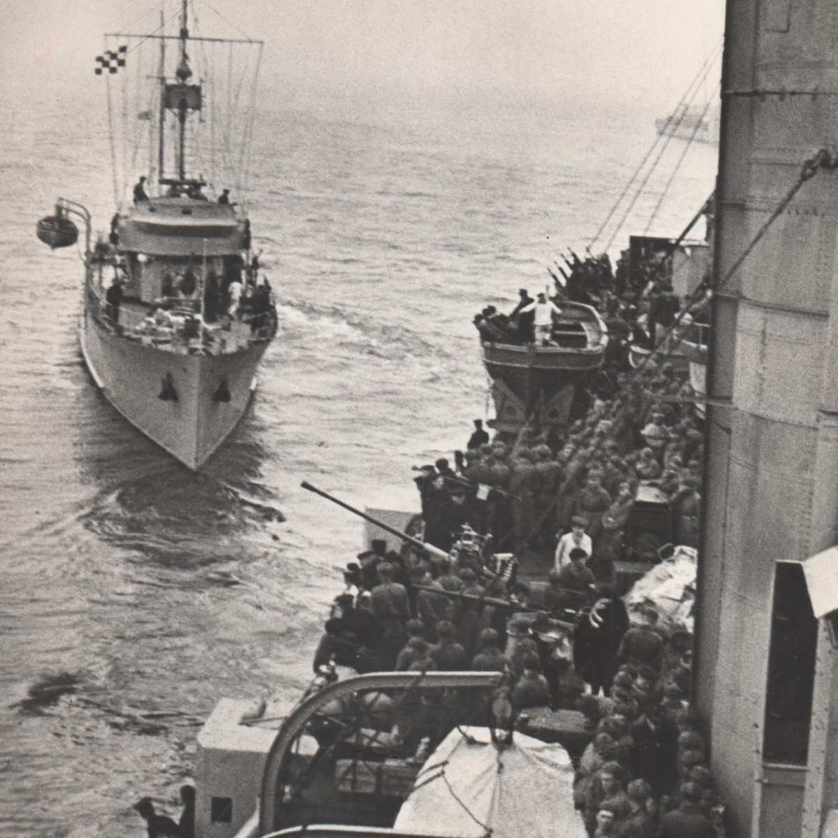 Press photo by D. Meshuev "A tanker is approaching the cruiser Krasny Krym for paratroopers"