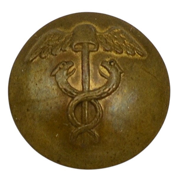 Lapel button from the uniform of a commercial school teacher