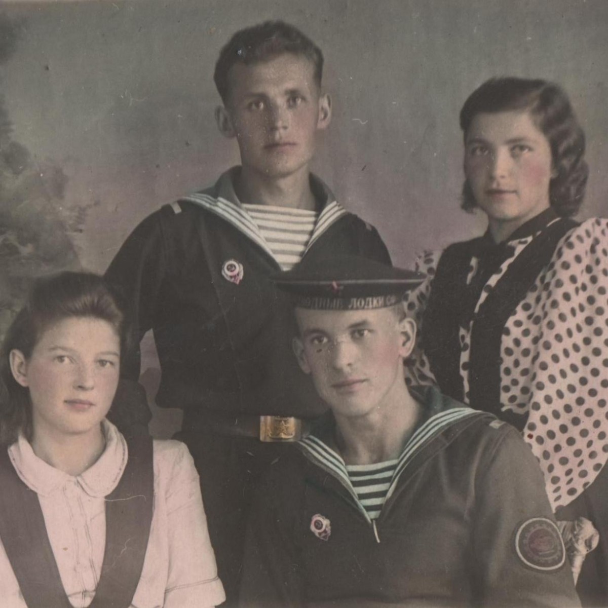 Photo of a sailor with the sign "Excellent submariner"