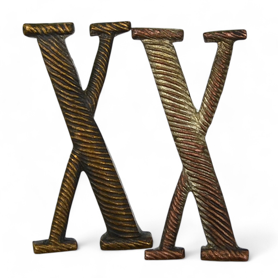 A pair of "X" ciphers of the 1914 model from the shoulder straps or epaulettes of the RIA pilot