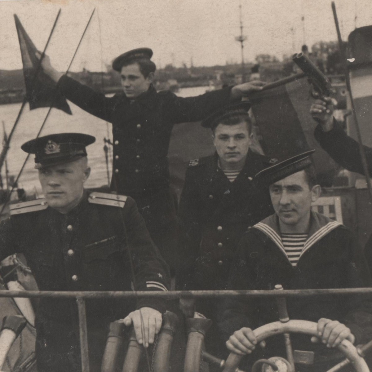 Photo of a lieutenant and sailors aboard a Soviet Navy ship