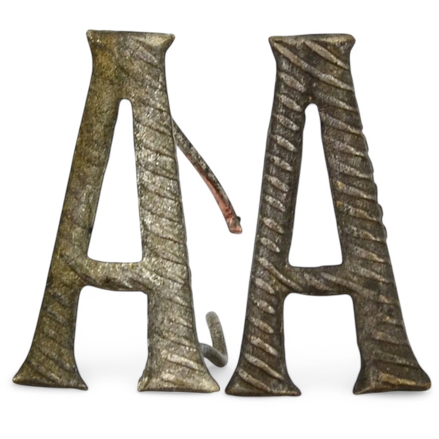 Paired ciphers "A" small mod. 1911 on shoulder straps or epaulettes of the RIA officer