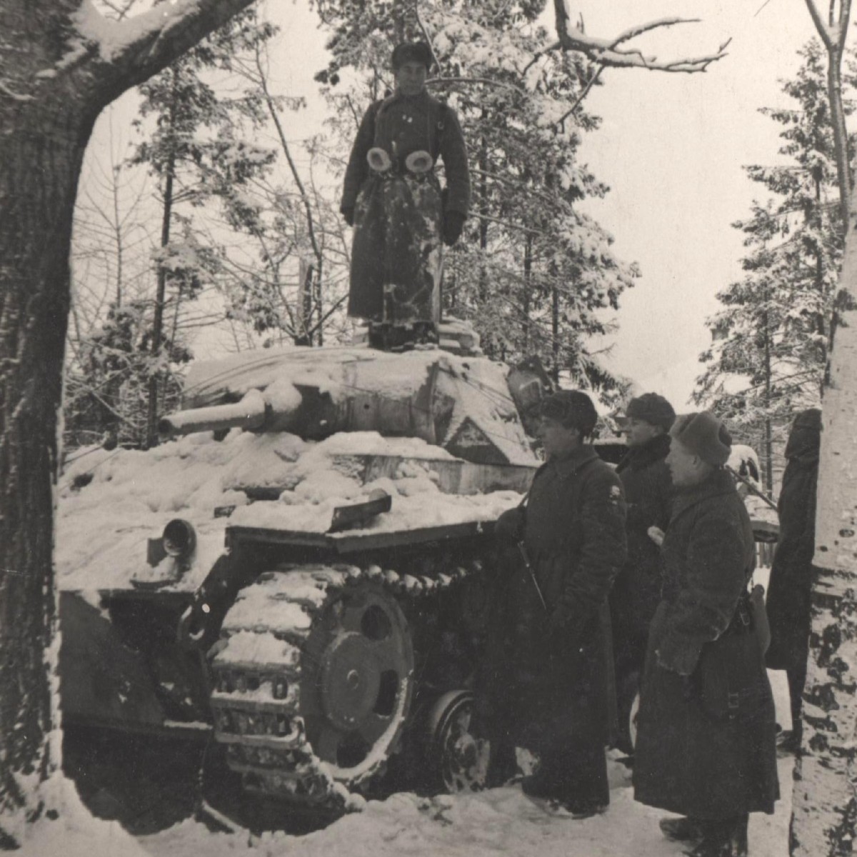 Photo by TASS (?) "Soviet commanders on a captured German tank"