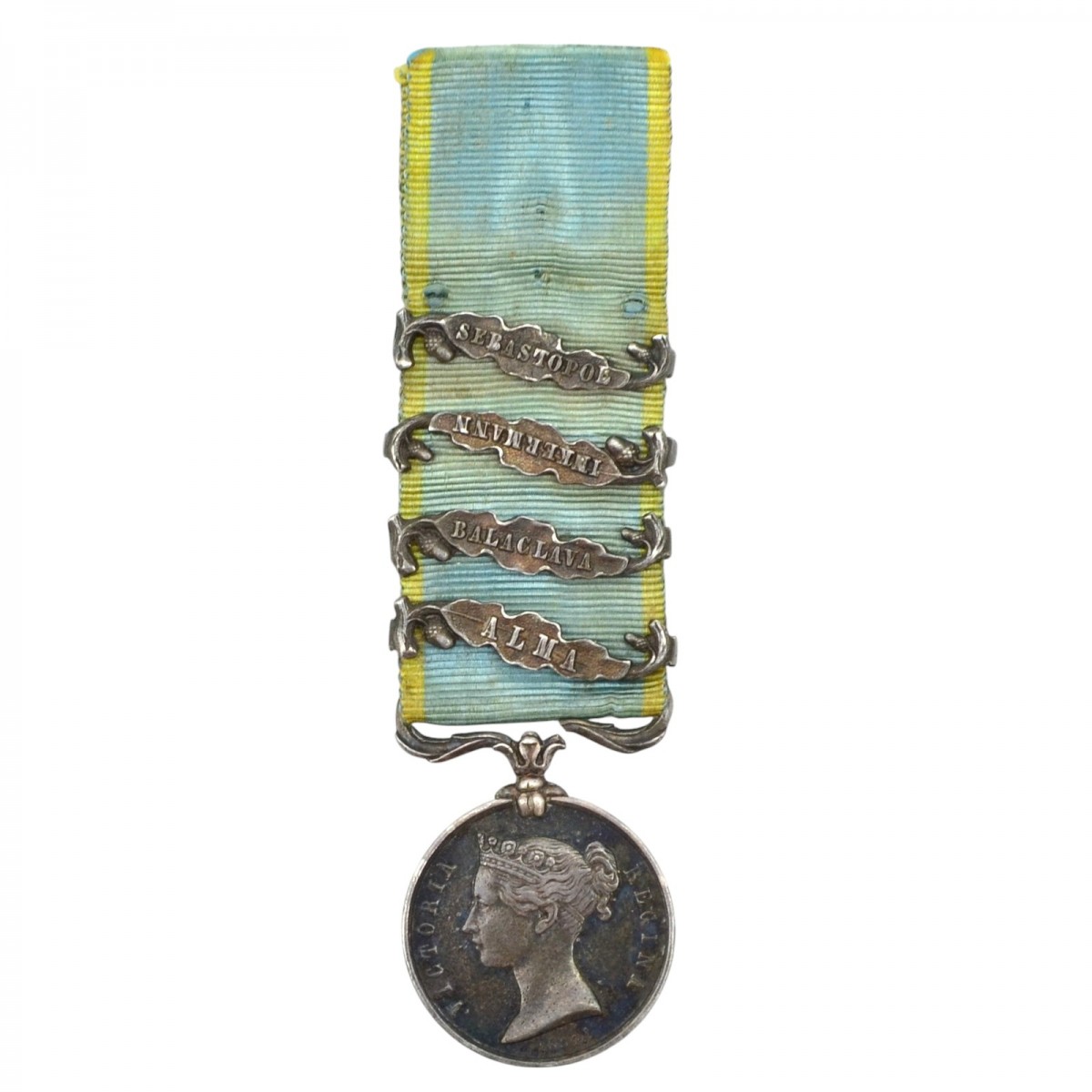 Medal of the participant of 4 battles in the Crimean War, miniature version