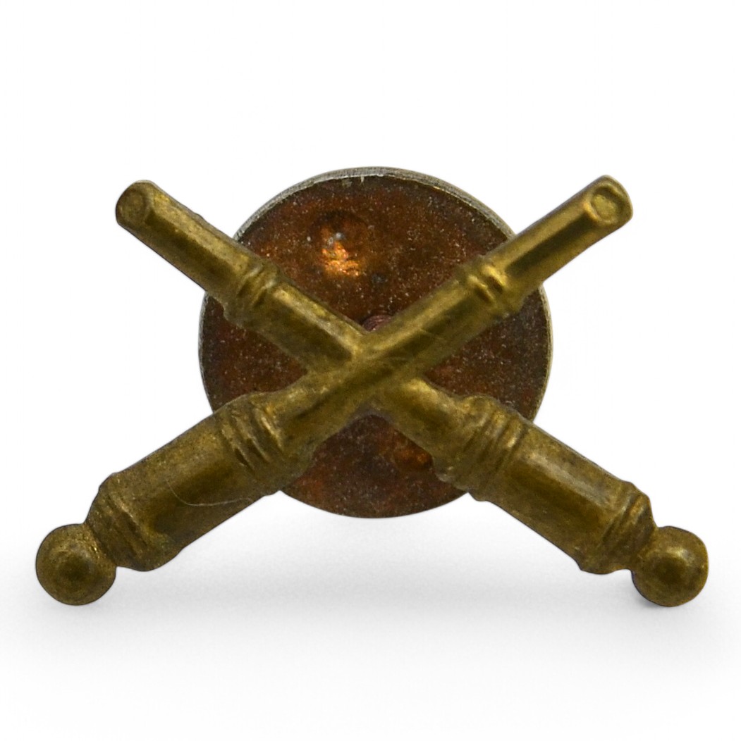 Emblem on the shoulder strap or buttonhole of a Red Army artilleryman, on a screw