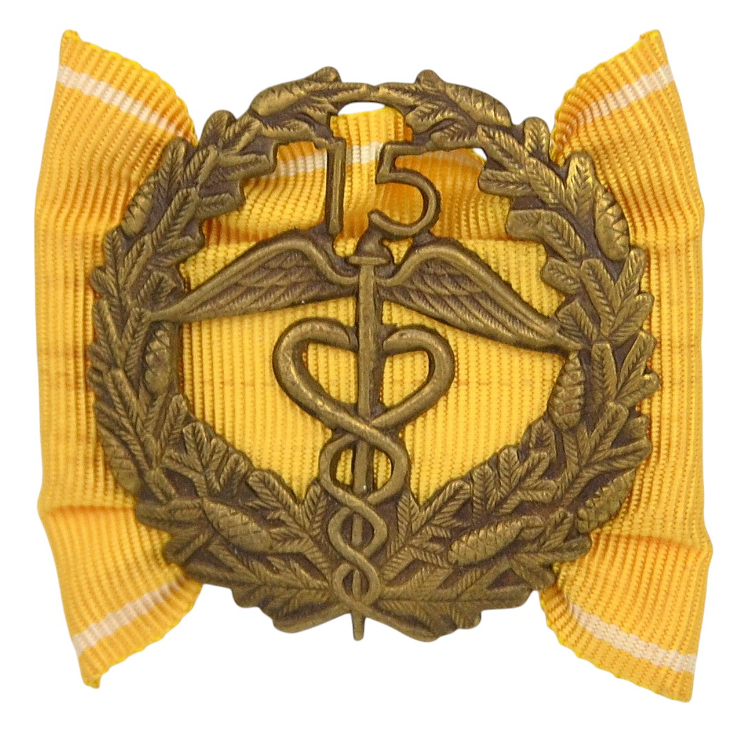 A badge for 15 years of service at the Finnish customs