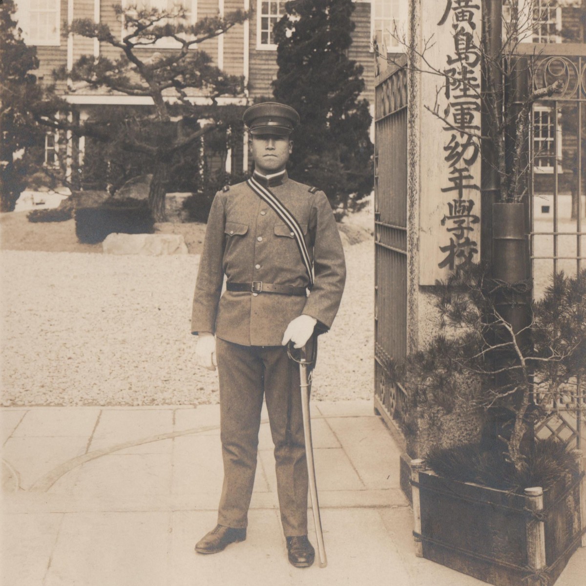 Photo of a Japanese soldier with a saber in 1886