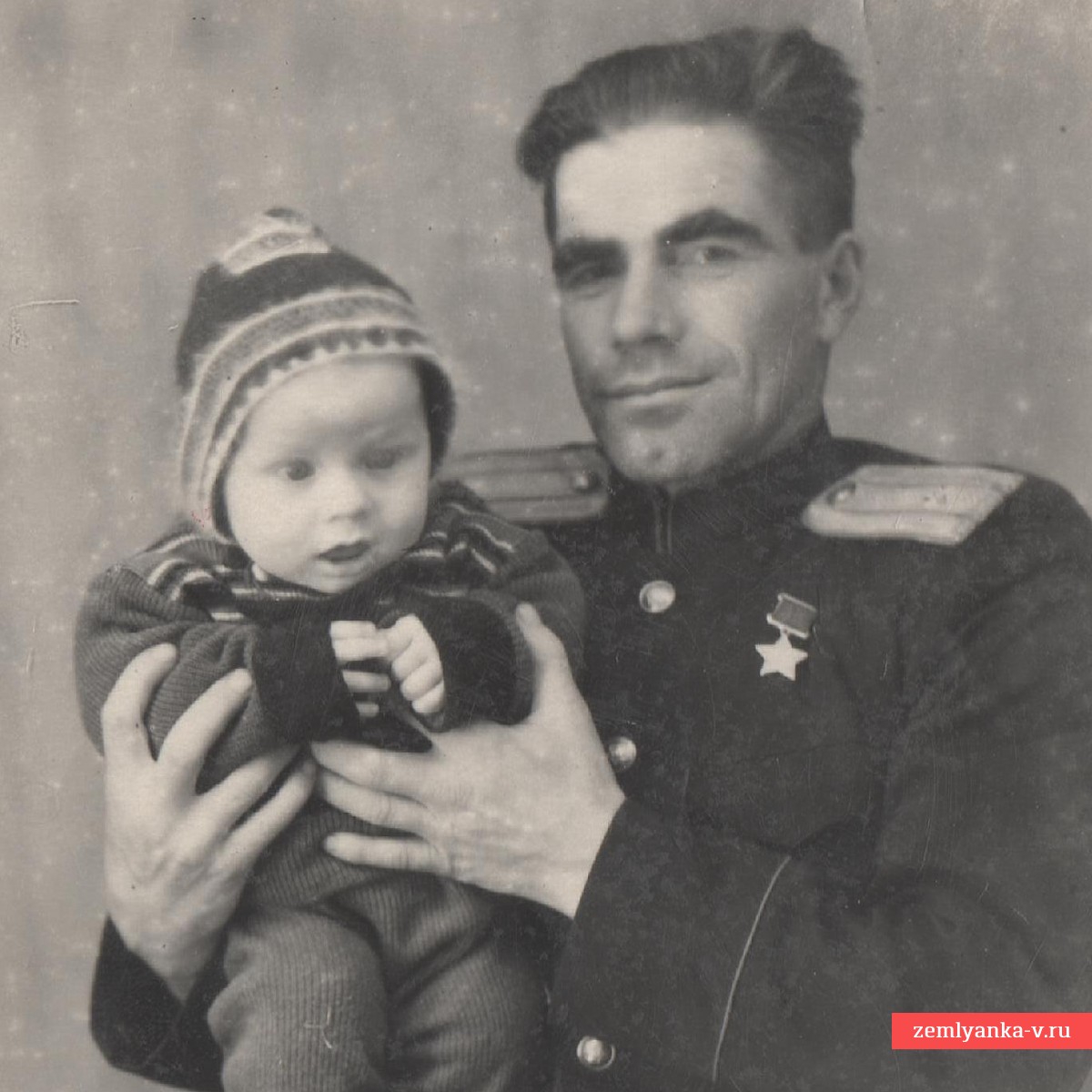 Photo of Hero of the Soviet Union A.P. Pytkin with his son