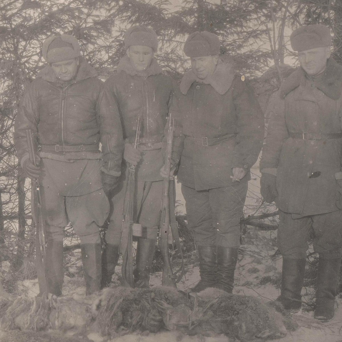 Photo of pilots of the 123rd Bomber Aviation regiment with hunting trophies, 1944